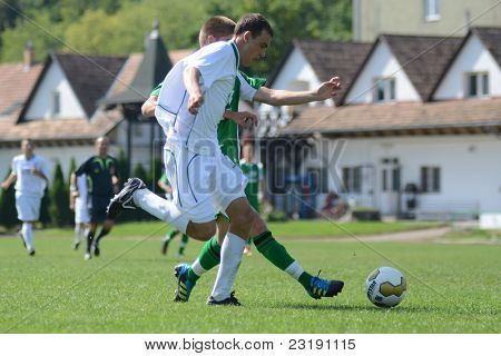 KAPOSVÁR, Maďarsko - 5. září: Kristof Kovacs (v zeleném) v akci na Maďarské národní Champ