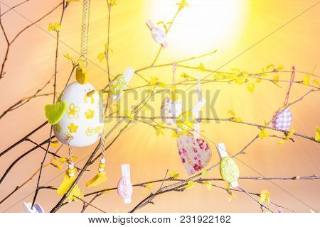 Composition Of Branches With Young Leaves And Green Buds, Decorated For Easter With Easter Eggs, Hea