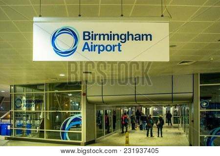 Birmingham , United Kingdom - March 02 2018 : Passengers In Airport At Night In Birmingham, United K