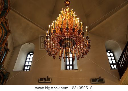 Luxury Gold Chandelier On Ceiling. Lighting. Interior Design