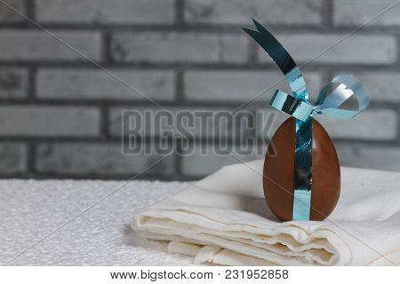 Delicious Seasonal Chocolate Easter Egg With A Ribbon