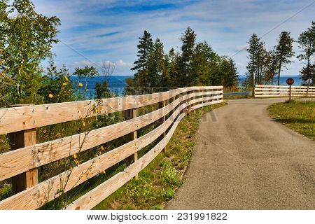 Charlevoix Michigan on Lake Michigan is a beautiful vacation destination.  A bike and running trail connects this city to popular Petoskey.