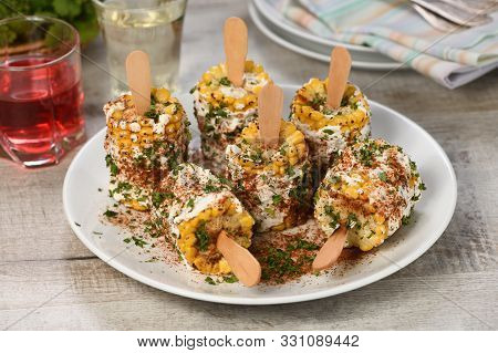 Delicious Indian Of Corn Cob, Also Called Bhutta, Flavored With Butter, Spices Garam Masala And Cila