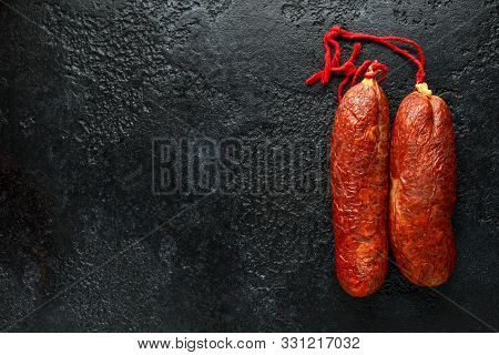 Traditional Balearic Raw Cured Meat Sobrassada Sausage Made From Ground Pork, Paprika And Spices On 