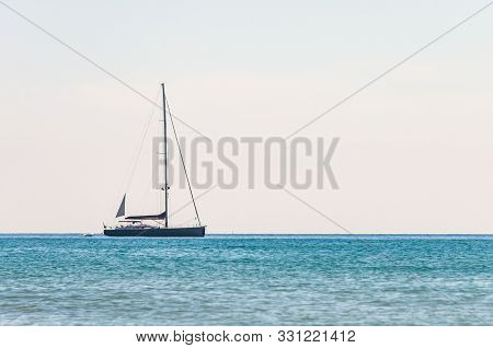 Sailing Yacht In The Tyrrhenian Sea Waters Near The Porto Ercole In The Province Of Grosseto, Tuscan