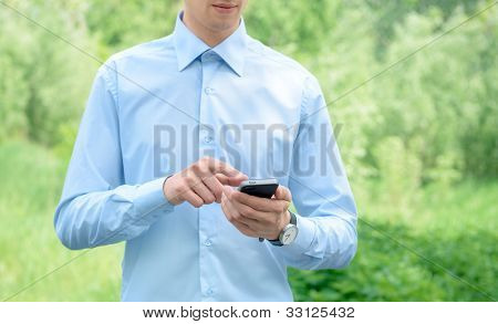 Podnikatel s mobilním telefonem