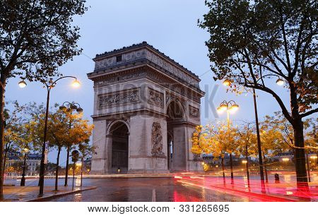 The Triumphal Arch In Evening, Paris, France.