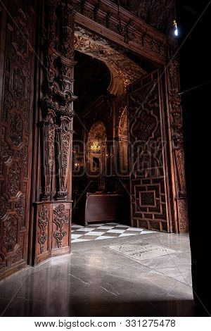 View Of The Wooden Door Entrance Of The Church Of Saint John (san Juan De Dios) In Granada, Spain.