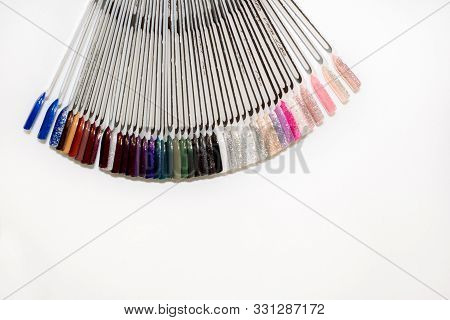 Manicure Cabinet, Gel Nail Polish In A Beauty Salon For A Girl. Set Of Different Nail Polish Colours
