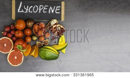 Fruits And Vegetables Containing Lycopene. Healthy Vegan Food Background. Lycopene Is A Red Caroteno