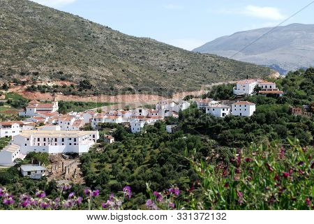 View Over Village Rooftops Towards The Mountains, Atajate, Malaga Province, Andalucia, Spain, Wester