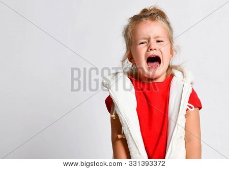 Portrait Of Crying, Yelling, Abused Kid Girl. Got Lost. In Difficulty. Helpless. Hopeless. Defencele