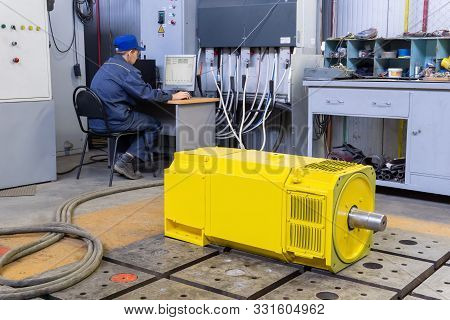Perm, Russia - October 11, 2019: An Engineer Tests An Electric Motor On A Test Bench