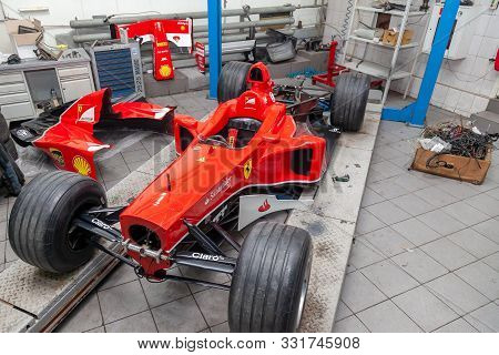 Novosibirsk, Russia - 11.01.2019: The Process Of Repairing And Restoring A Red Ferrari Formula 1 Car