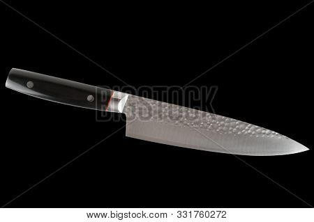 Brand new Japanese kitchen knife isolated on black background with clipping ppath