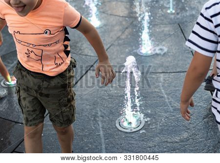 Children Playing In A Water Fountain In Lublin