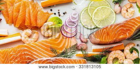 Banner Of Fresh Seafood On A Table With Spices, Vegetables And Olive Oil: Fresh And Smoked Salmon, S