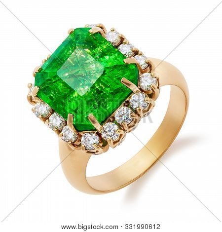 Golden Ring With Big Emerald And Diamonds Isolated On White Background