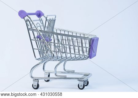 Shopping Basket On Wheels. Shopping, Sales Concept. Empty Shopping Cart
