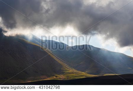 Dramatic mountain landscape near Castelluccio village in National Park Monte Sibillini, Umbria region, Italy