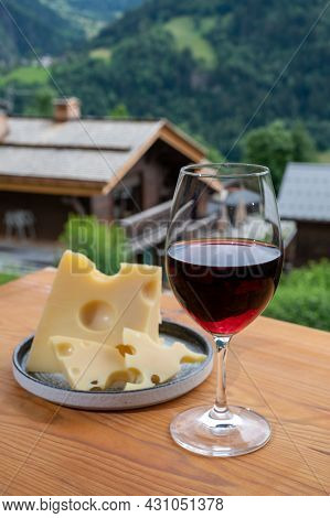 Cheese Collection, French Cow Cheese Emmental, Glass Of Red Wine From Savoie And French Mountains Vi