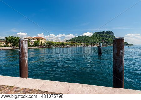 Beautiful Bay In Front Of The Small Town Of Garda, Tourist Resort On The Coast Of Lake Garda (lago D