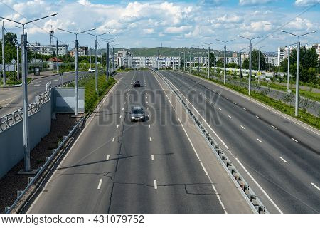 Multi-lane Highway With A Dividing Strip. Automobile City Road On A Summer Day.