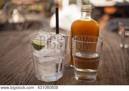 Jamu With Orange, Turmeric, Ginger, Cumin, Ice.
