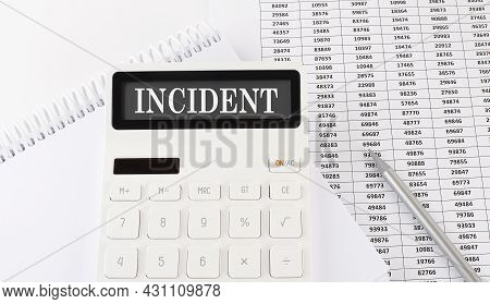 Calculator With Text Incident On Notebook . Business, Finance Conceptual.
