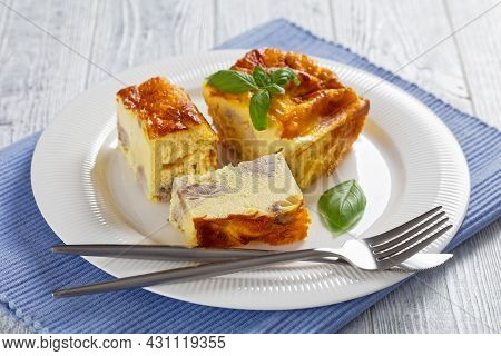 Chicken Breast And Egg Bake, Chicken Meat Omelette On A White Plate With Silver Fork And Knife On A 