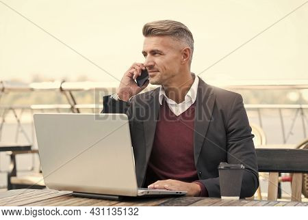 Remote Management. Online Service Manager Work In Internet Cafe. Sales Manager Make Phone Call To Cl