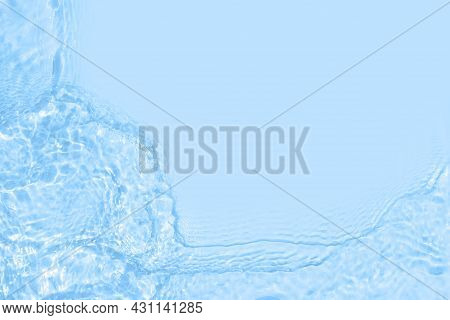 Serum Texture Close Up. Light Blue Liquid Gel Background. Transparent Beauty Skincare Product Sample