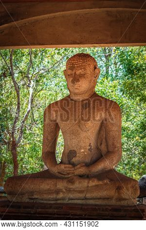 Samadhi Buddha meditating Buddha image ancient statue in Anuradhapura - famous tourist attraction and archaelogical site, Sri Lanka