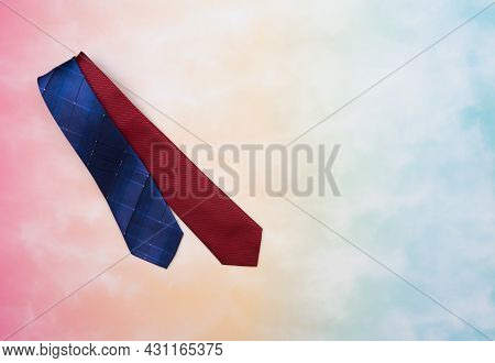 Scene Of Stacking Of Two Tie Gifts At Left Side For Father Or Dad In Father's Day With Colorful Back
