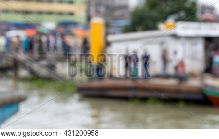 Defocused Blurry Public Gathering Near At Buriganga River Bank In Bangladesh