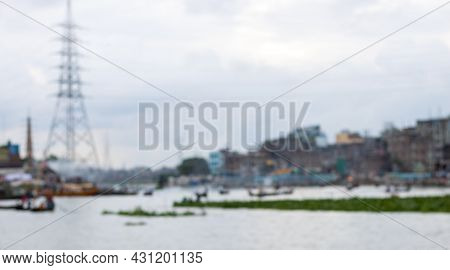 Defocused Abstract View Of Passing Boats And Trawlers On A Busy River In Bangladesh