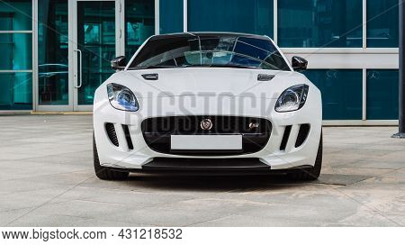 Moscow, Russia - August 2021: Jaguar F-type S Coupe Parked On The Street In Moscow. White Supercar I