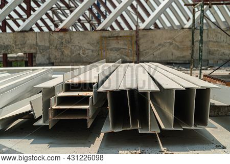 I-beam Steel, I-beam Steel Painted White Lay Piles On Concrete, Raw Materials Used In Building Const