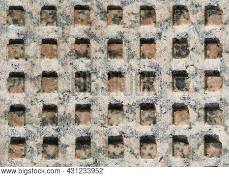Background From Marble Texture With Square Cells Of Brown And Gray Color Close-up On A Sunny Day