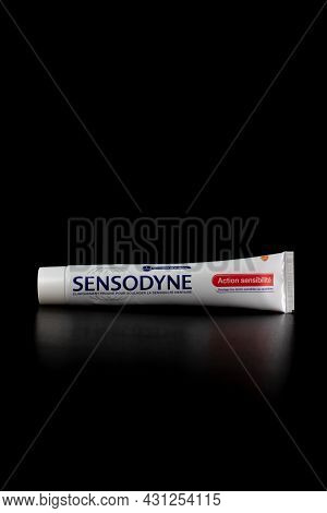 Sensodyne Toothpaste Tube On Black Background. Bucharest, Romania, 2021