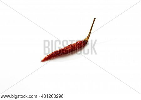 Dry Red Hot Chili Peppers On White Background