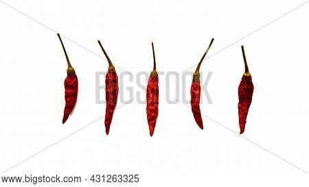 Dry Red Hot Chili Peppers On White Background