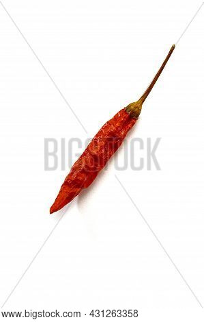 Dry Red Hot Chili Peppers On White Background