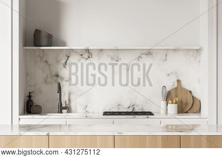 Kitchen Cooking Area Interior With Breakfast Bar, Sink And Stove. Open Shelf, Marble Splashback, Whi