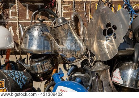 Death Valley National Park, United States: February 18, 2021: Engraved Silver Teakettle At Teakettle