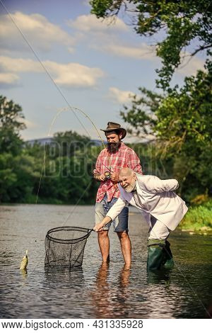 We Can Do It. Catching And Fishing Concept. Two Male Friends Fishing Together. Fly Fish Hobby Of Bus