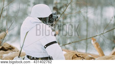 Hidden Re-enactor Dressed As German Wehrmacht Infantry Soldier In World War Ii Soldiers Sitting In A