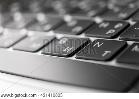 Ko,puter Keyboard Shallow Dof. Backspace In Main Focus And Keys With Latin And Cyrillic Symbols.