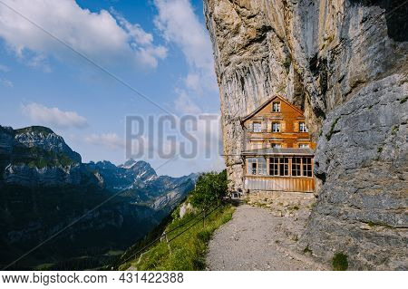 Swiss Alps And A Mountain Restaurant Under The Aescher Cliff Viewed From Mountain Ebenalp In The App