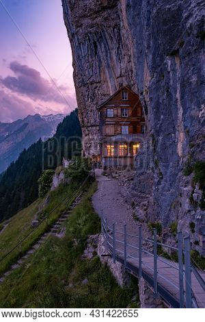 Swiss Alps And A Mountain Restaurant Under The Aescher Cliff Viewed From Mountain Ebenalp In The App